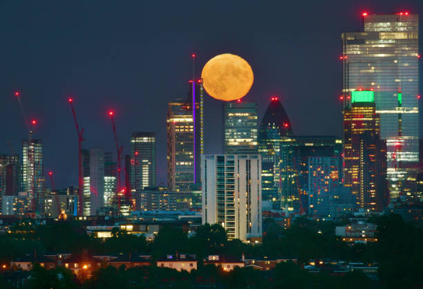 istock Moon rise over London Cityscape 1254557016