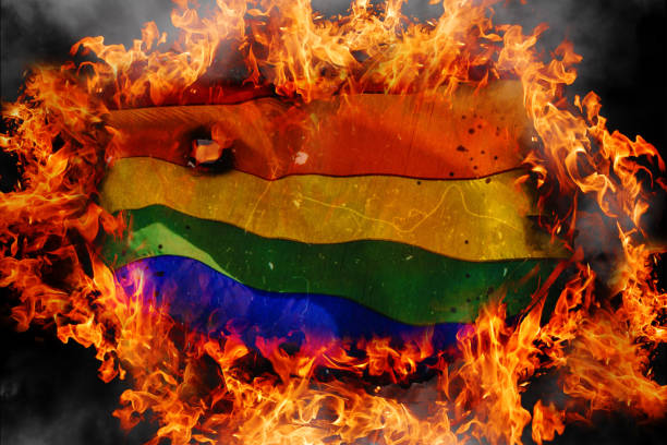 Download Concept Of Lgbt Tolerance Burning Rainbow Flag Of Lgbt On Fire  Flames Background Blackened Charred Edges Of Symbolic Flag Stock Photo -  iStock