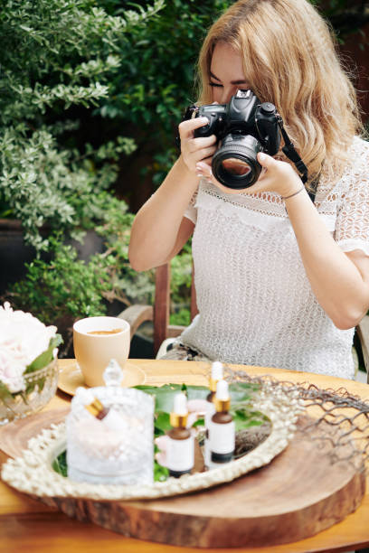 istock Blogger photographing cosmetics 1254557948