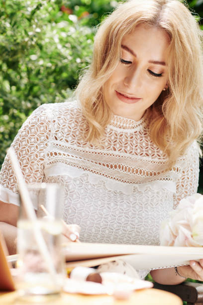 istock Businesswoman writing down ideas 1254557958
