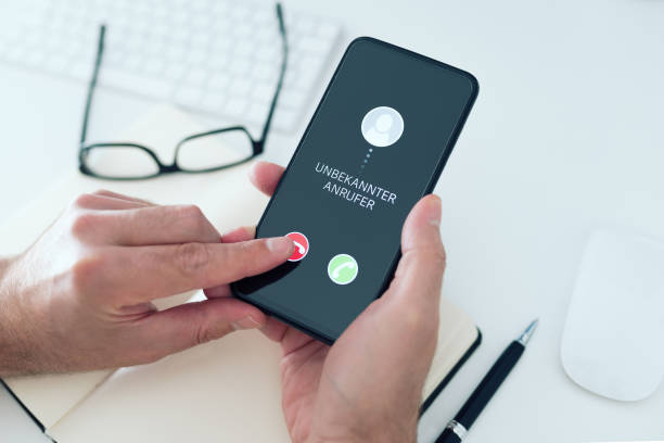 istock person rejecting call from unknown caller or unknown number on smartphone 1254559721