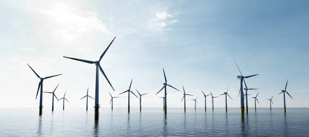 offshore wind turbines farm on the ocean. sustainable energy - sea wind turbine turbine wind imagens e fotografias de stock