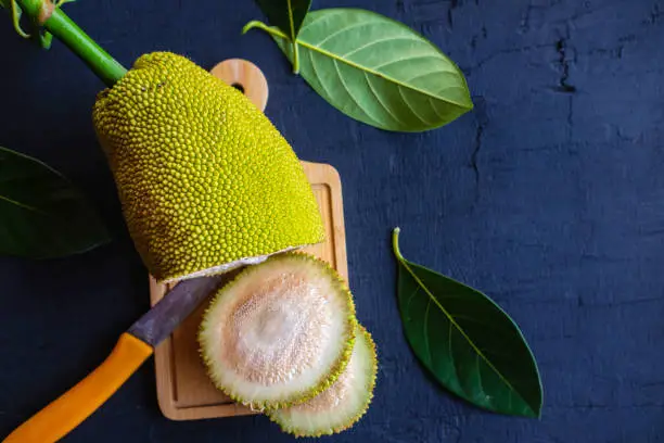 Jackfruit sliced fruit on black background