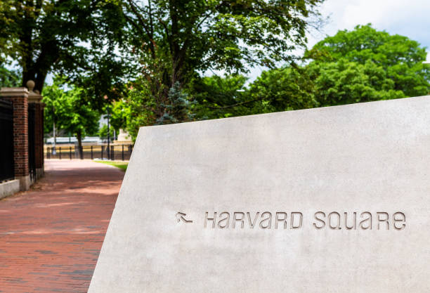 Stone sign pointing the way to Harvard Square