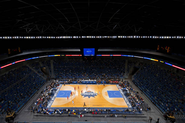 High angle view of basketball players playing on court.