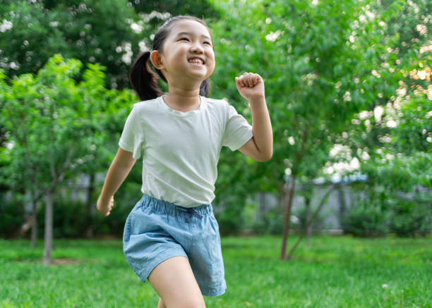 istock Cute Little Girl Playing 1254565905