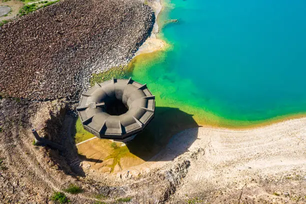 Aerial drone shot of a overflow on a water reservoir