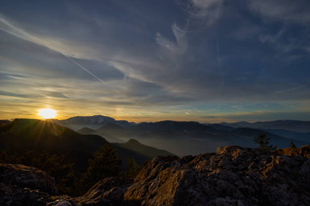 istock Sunset over fog 1254568519