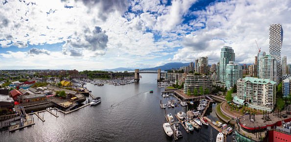 False Creek, Downtown Vancouver, British Columbia, Canada. Beautiful Panoramic Aerial View of a Modern City during a vibrant day. Cityscape Panorama