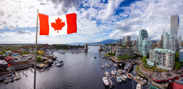 False Creek, Downtown Vancouver, BC, Canada Canadian National Flag Composite. False Creek, Downtown Vancouver, British Columbia, Canada. Beautiful Panoramic Aerial View of a Modern City during a vibrant day. Cityscape Panorama false creek stock pictures, royalty-free photos & images