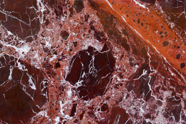 istock The red marble.Finishing stone. Texture. 1254571263