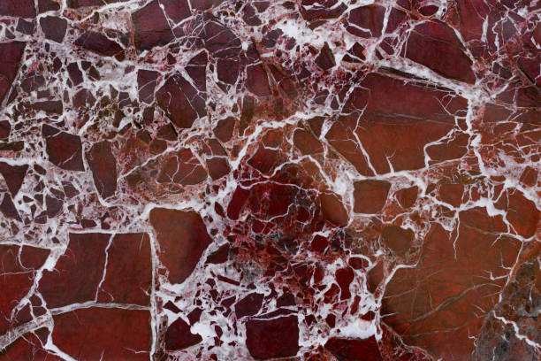 istock The red marble.Finishing stone. Texture. 1254571295