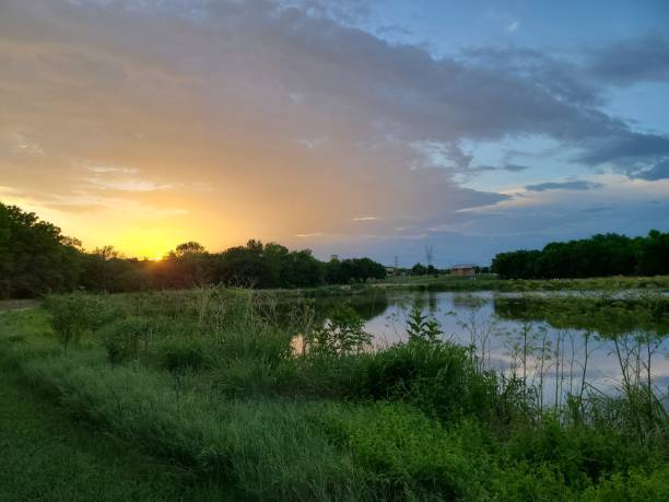 istock Beautiful sunset over lake 1254572125