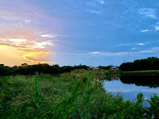 istock Beautiful sunset over lake 1254572137