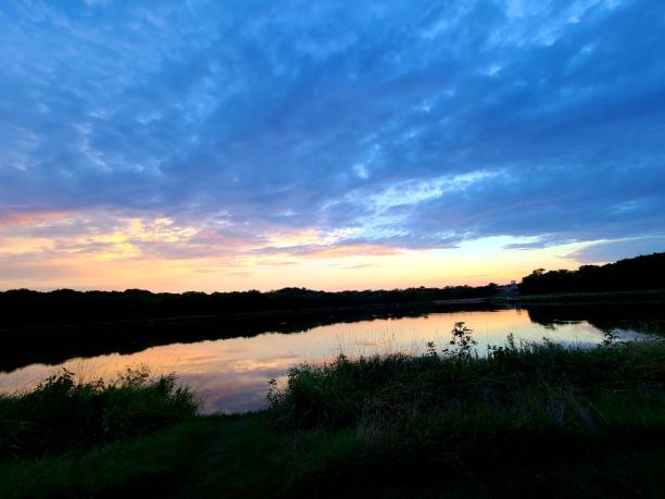 istock Beautiful sunset over lake 1254572653