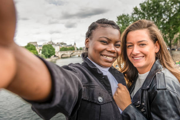 istock Friends in Paris taking selfie 1254573234
