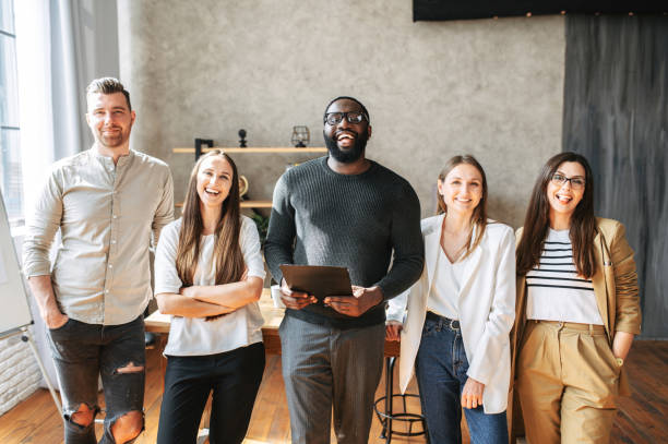 istock Cohesive cheerful multiracial team 1254577066