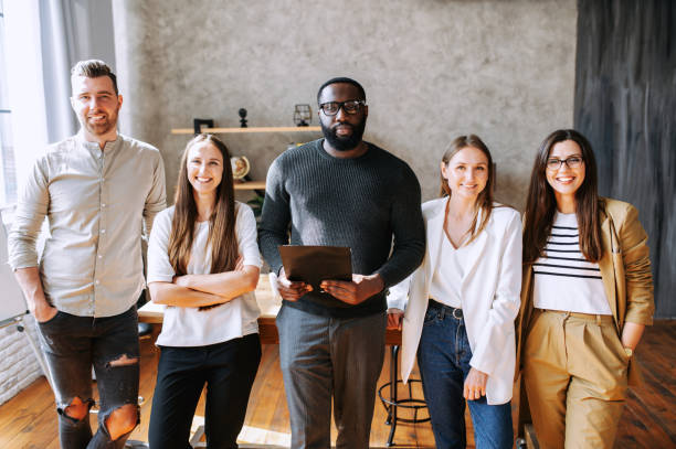 istock Cohesive cheerful multiracial team 1254577073