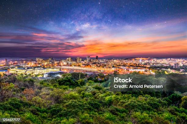 Pretoria City At Night With Sky Full Of Stars And Illuminated Buildings And Streets Stock Photo - Download Image Now