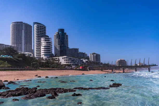 Photo of Umhlanga beach and beachfront buildings during summer