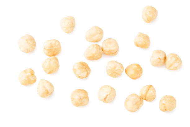 istock hazelnuts isolated on white background. top view 1254578838