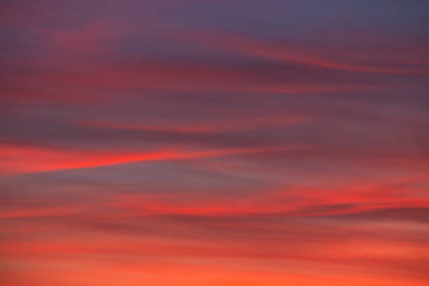 istock background of sunset cloudscape with red clouds 1254580278
