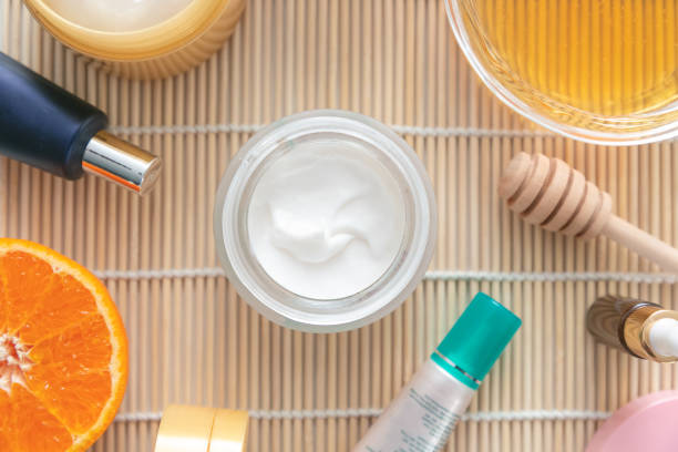 istock Composition with cosmetic cream on wooden background. top view 1254580856