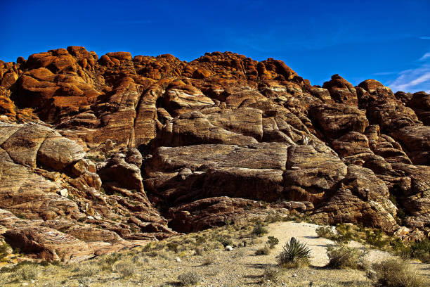 istock Red Rock Canyon State Park features scenic desert cliffs, buttes and spectacular rock formations. The park is located where the southern tip of the Sierra Nevada converges with the El Paso Mountains. 1254581000