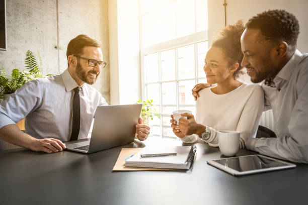 family couple consultations with a lawyer or insurance agent. - lawyer family talking discussion imagens e fotografias de stock