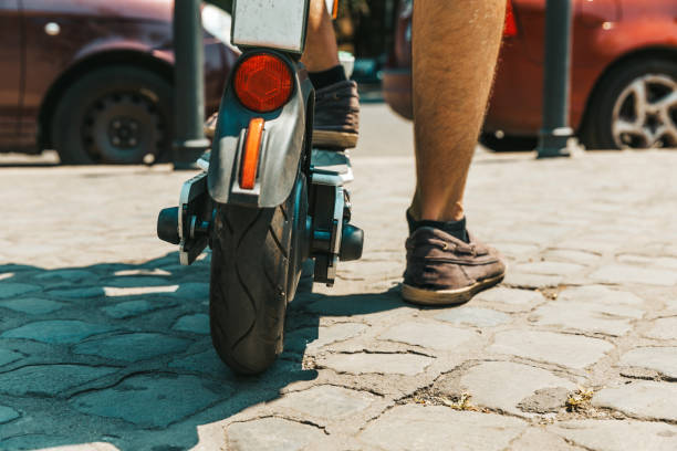 istock Electric Push Scooter in City Center 1254585675
