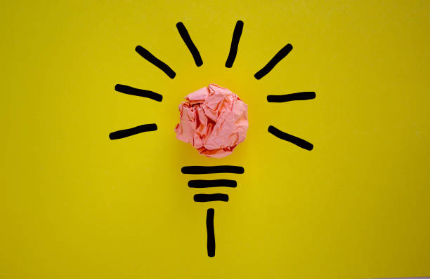istock Idea and innovation concept image. Beautiful yellow background. 1254587400