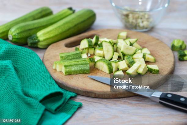 Green Zucchini Sliced On A Cutting Board Fresh Vegetables For Cooking At Home Stock Photo - Download Image Now
