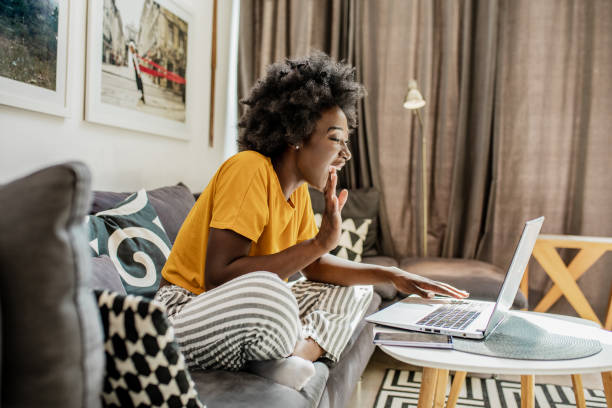 istock Young African woman on a video call 1254591695