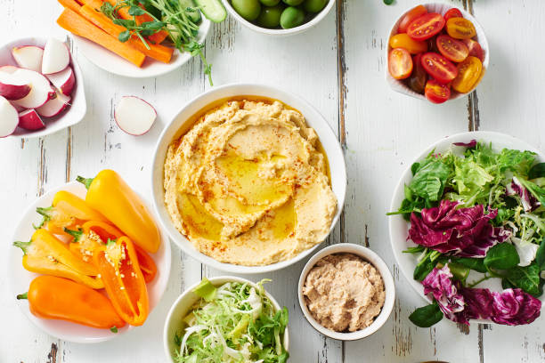 istock Hummus dip and healthy vegetarian snacks 1254592087