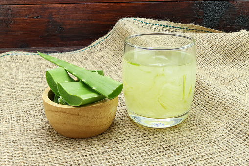 Aloe Vera for drinking on wood table
