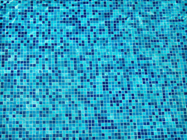 istock Surface of blue ripped water in swimming pool 1254594113