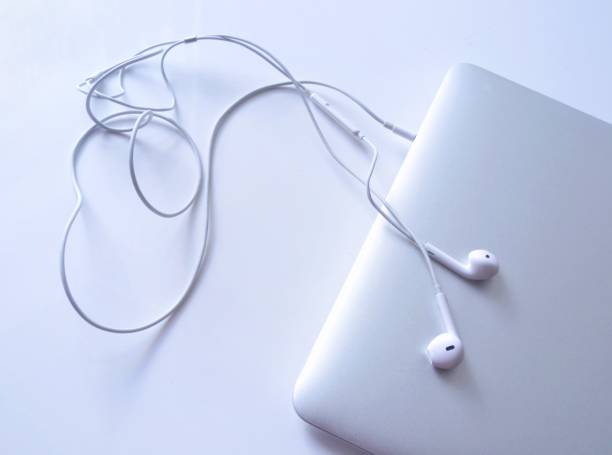 istock Headphones and laptop 1254598271
