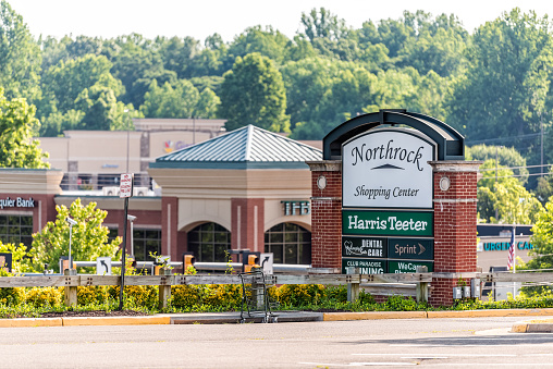 Warrenton, USA - June 9, 2020: Sign for Northrock Shopping Center Strip Mall with Harris Teeter Kroger grocery store business in Virginia