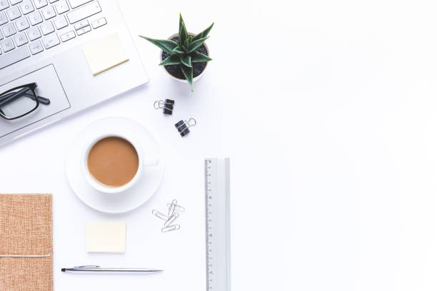 istock Flat lay, Workplace with laptop, coffe and office supplies on withe desk. With copy space. 1254606808