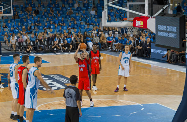 istock Basketball player taking penalty shot 1254607339