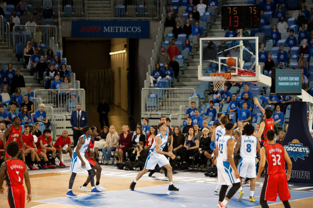 istock Basketball player aiming hoop 1254607520