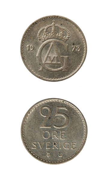 istock 25 ore 1973 coin isolated on white background 1254607550