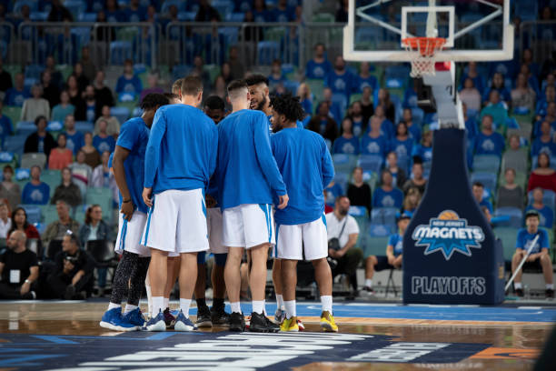 istock Basketball players discussing strategy 1254608231