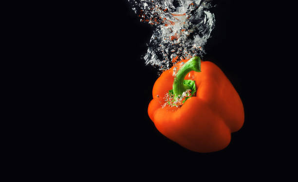 istock Red paprika in water 1254614566