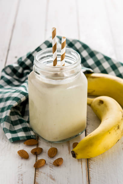 istock Banana smoothie with almond in jar 1254614704