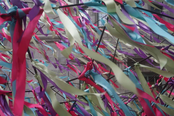 istock selective focus random cheerful colorful strips fly in the air. 1254616962