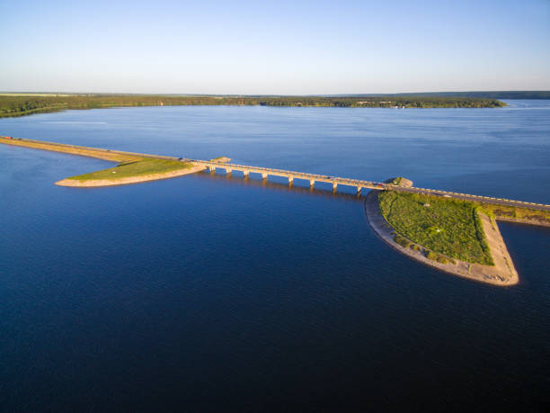 istock Aerial view to bridge on river at sunset, Severskiy Donets river 1254617482