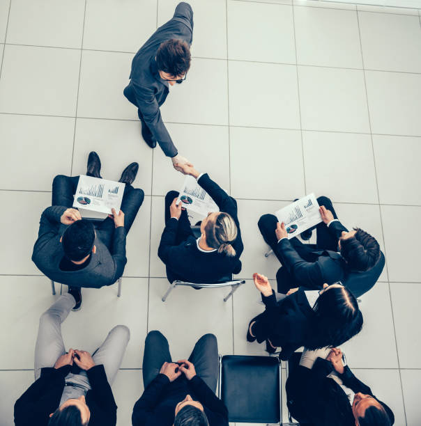 istock working group discussing a new strategy at an office meeting 1254618084