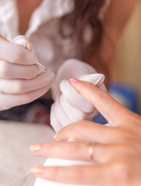 istock process of working on a manicure on the nail by hand 1254619915