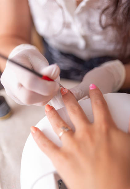 istock beauty procedures, nail varnishing 1254620532